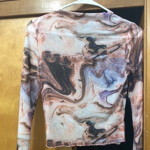A sheer pink marble shein top